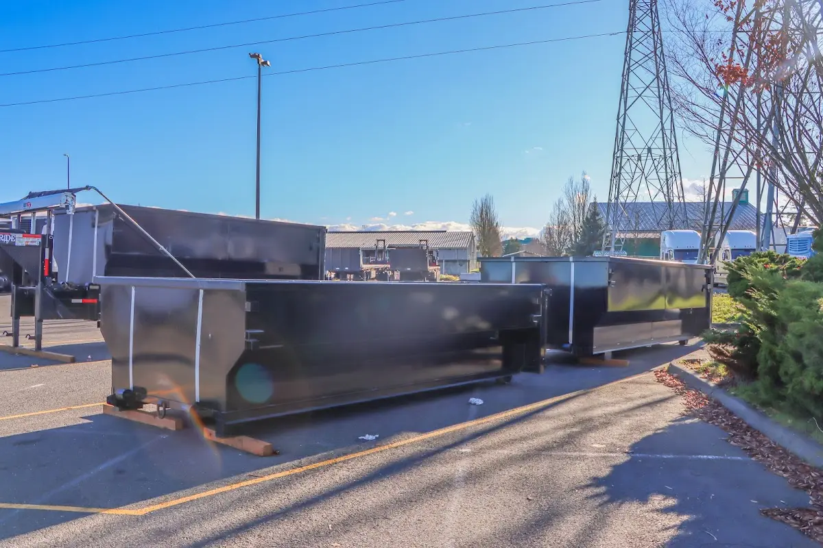 Roll-off dumpster ready for waste disposal at job site for Yard Waste Dumpster Rental in Elizabeth City